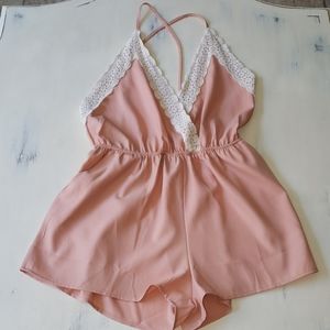 Criss cross back romper with lace detail